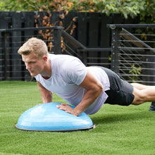 man using Bosu Ball Balance Trainer in blue